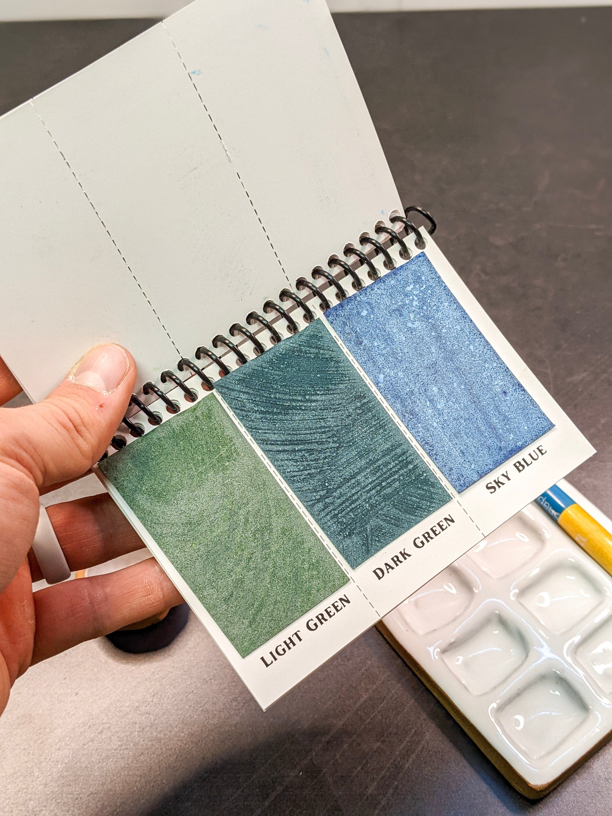 inner sheets of the mini complete edition a mini version of our celebrated and popular Complete Edition portable watercolor palette.