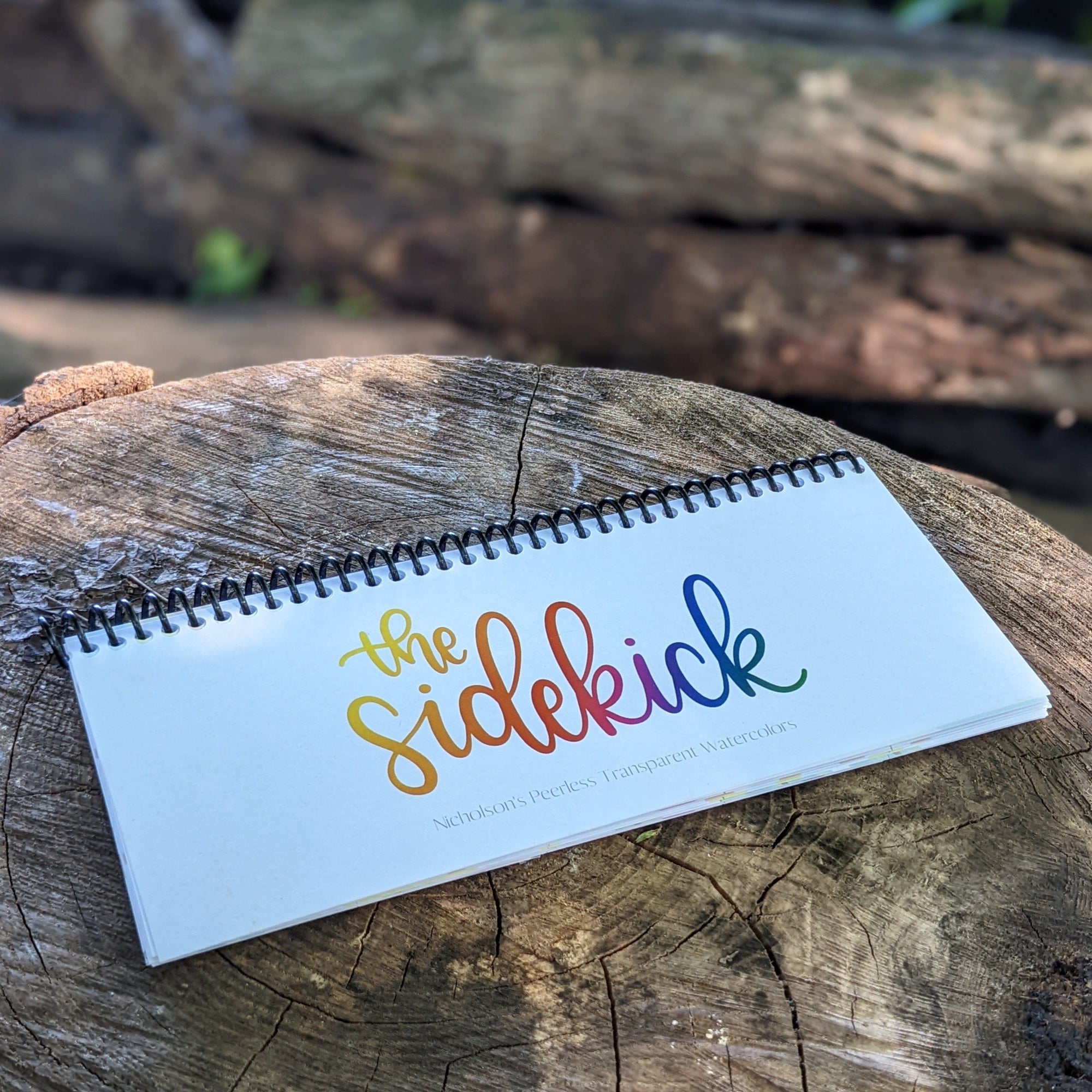 side profile of peerless watercolors portable watercolor palette the Sidekick. This watercolor palette is super vibrant, portable, and easy to use.