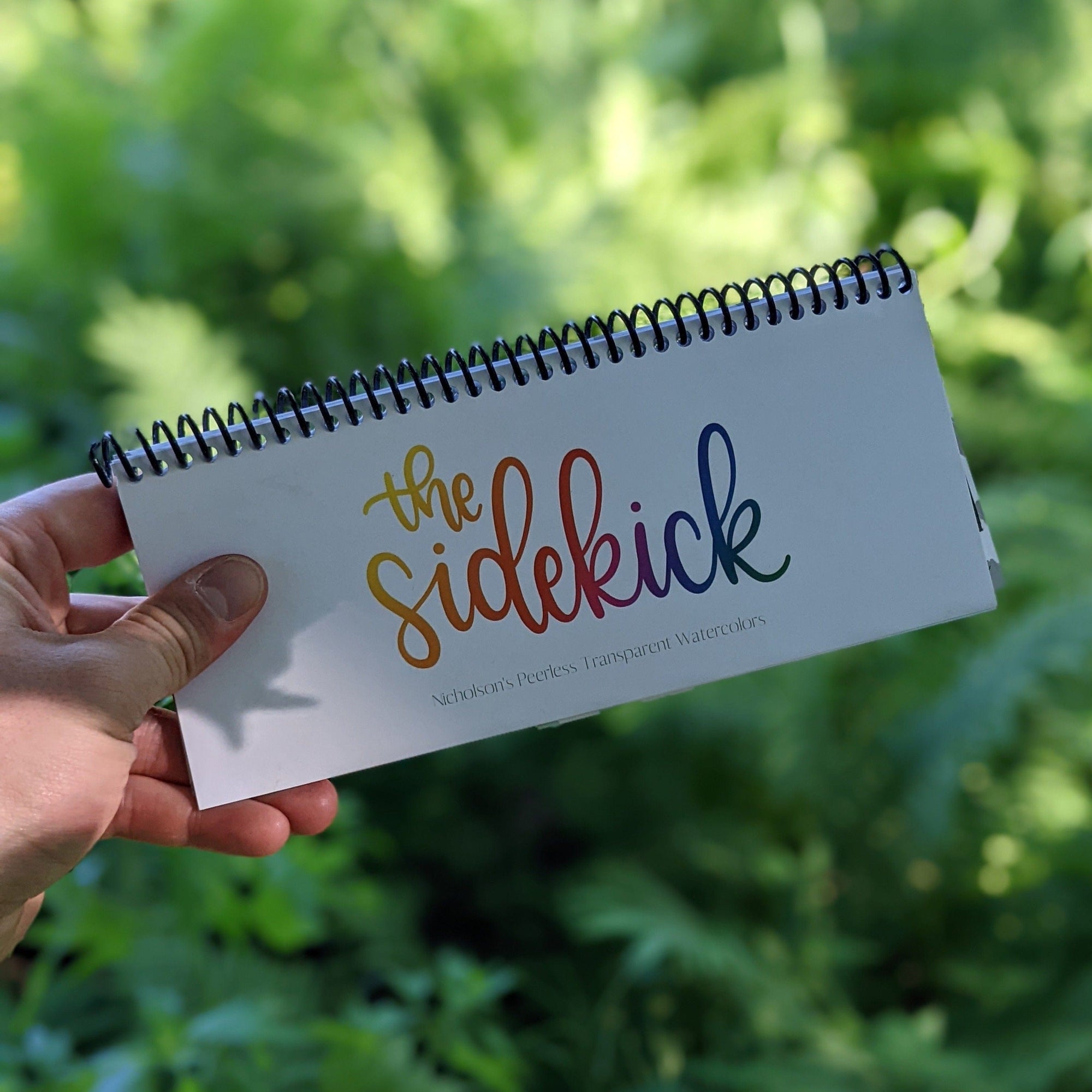 front profile of the peerless watercolors travel palette called the sidekick.
