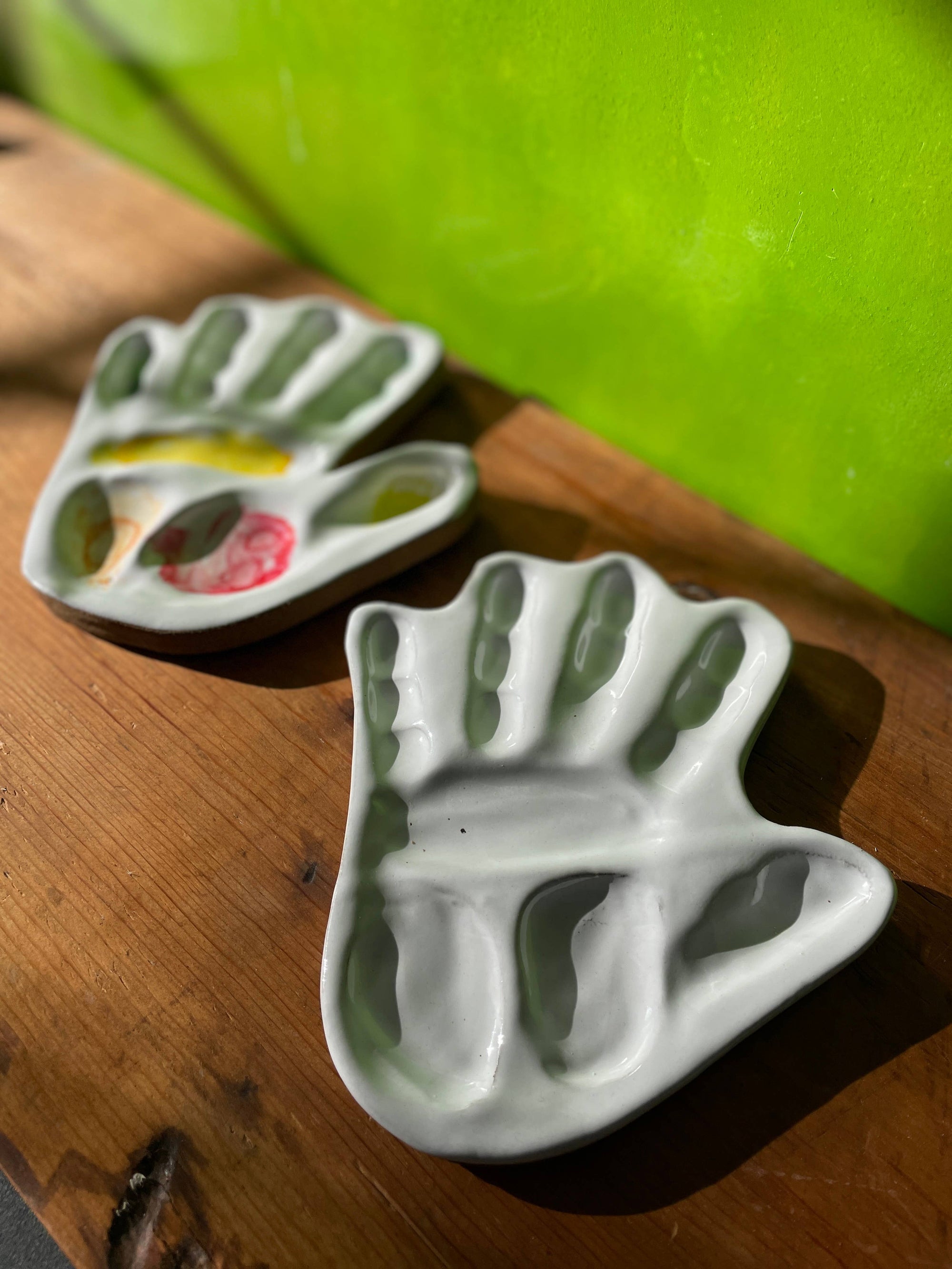 hand made, ceramic palette, modeled after the hand of the artist that made the watercolor mixing palette