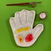 hand made, ceramic palette, modeled after the hand of the artist that made the watercolor mixing palette